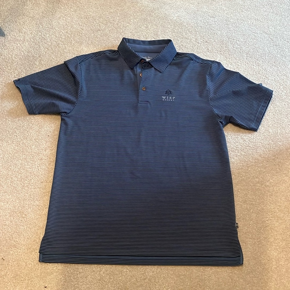 Men’s Straight Down polo with Wisp Resort embroidery.